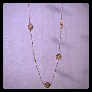 Long gold necklace